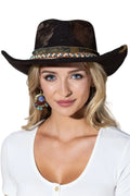 Distressed black cowgirl hat with a turquoise and bead band, worn by a model with wavy blonde hair and gold earrings.