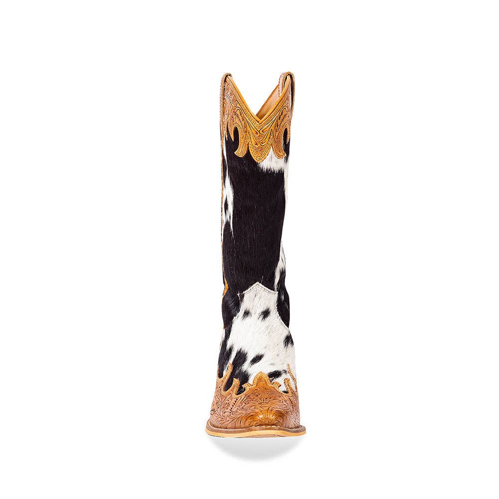 High top boots featuring a black and white hair-on cowhide upper, detailed hand-tooled leather, and a snip toe.