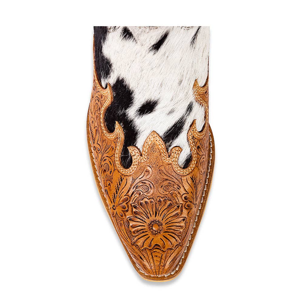 Snip toe high top boots featuring a black and white hair-on hide, hand-tooled honey leather, and ornate floral designs.