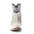 Cream ankle booties with cascading fringe, angel wing embroidery, a snip toe, and a 2-inch western heel.