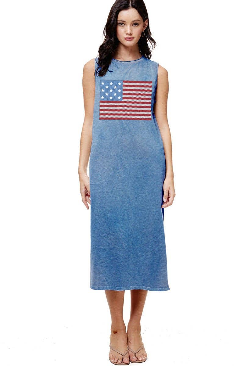 Soft mineral-washed blue midi dress featuring an American flag graphic, sleeveless design, and side slits.
