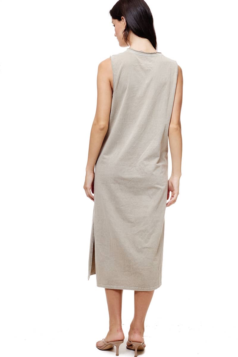 Soft, mineral-washed beige midi dress with a muscle tank style and side slits, paired with nude heels.