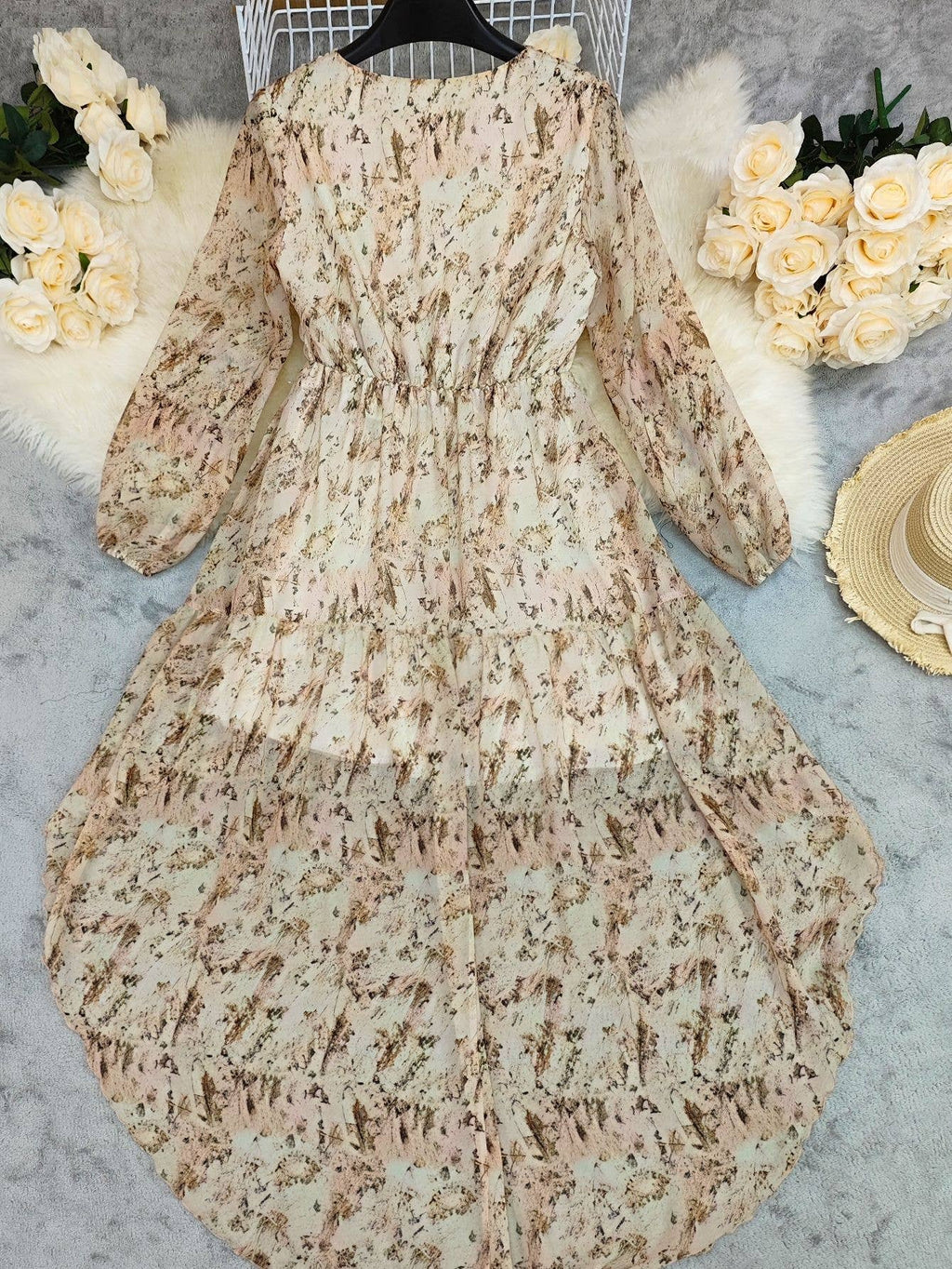 V-neck floral printed bohemian layered dress in beige with pink and brown patterns, featuring long sleeves and an elastic waist.