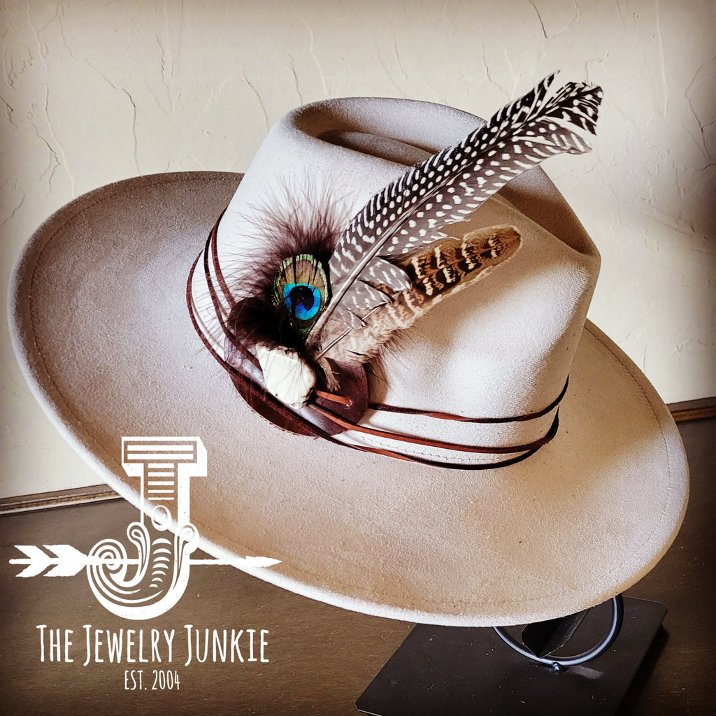 Boho Western felt hat in cream with a wide flat brim, featuring feathers and a turquoise leather band accent.