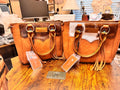 Montana West Hair-On Hide Concealed Carry Tote Bag in tan with floral-tooled straps, fringe detailing, and turquoise conchos.