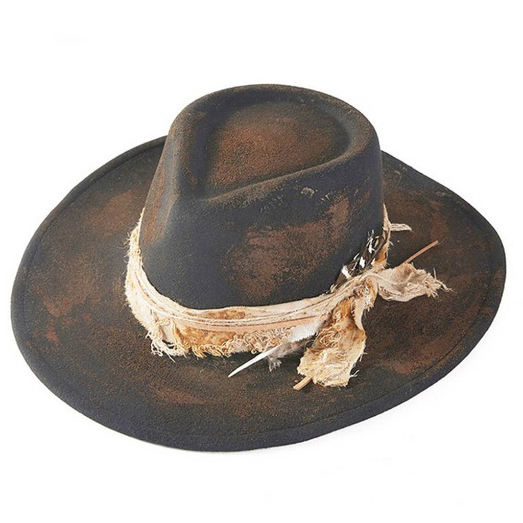 Vintage cowgirl and fedora hat with distressed fabric band and feather embellishment
