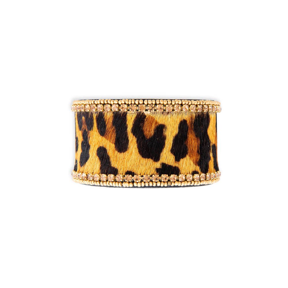 Chunky beaded bracelet featuring a leopard print design, with gold-tone embellishments and varying textures.