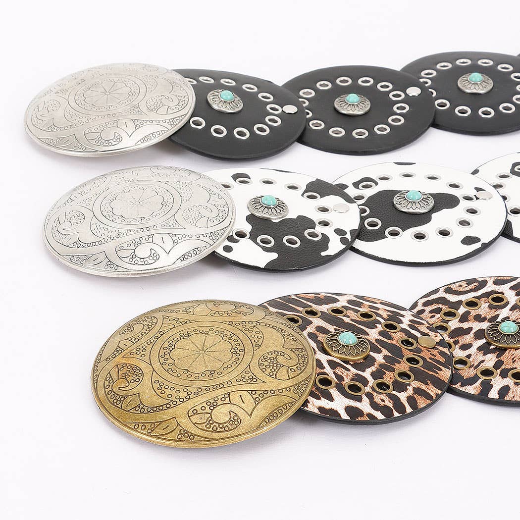 Faux leather disc belt with decorative metal and stone accents in bohemian design