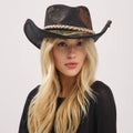 Black distressed fabric cowgirl fedora hat with a rustic band and shapeable brim, worn by a model with long blonde hair.